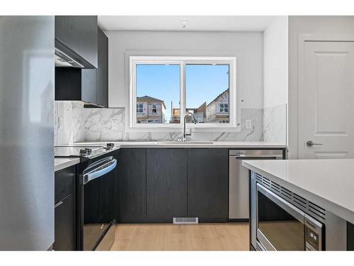 531 Union Avenue Se, Calgary, AB - Indoor Photo Showing Kitchen With Stainless Steel Kitchen