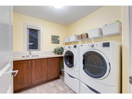 108 Elgin Estates Park Se, Calgary, AB - Indoor Photo Showing Laundry Room