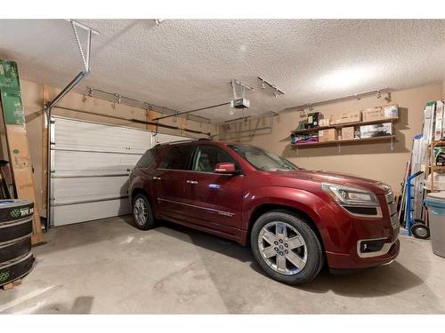 108 Elgin Estates Park Se, Calgary, AB - Indoor Photo Showing Garage