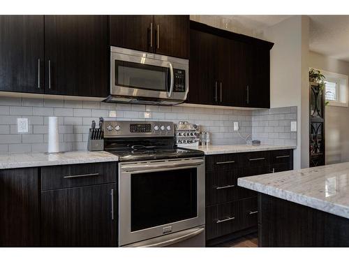 208 Legacy Crescent Se, Calgary, AB - Indoor Photo Showing Kitchen With Upgraded Kitchen