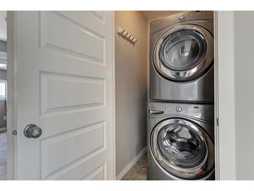 208 Legacy Crescent Se, Calgary, AB - Indoor Photo Showing Laundry Room