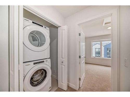 111-8500 19 Avenue Se, Calgary, AB - Indoor Photo Showing Laundry Room