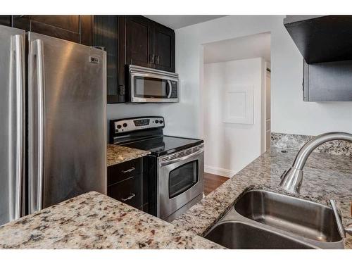 1105-733 14 Avenue Sw, Calgary, AB - Indoor Photo Showing Kitchen With Stainless Steel Kitchen With Double Sink With Upgraded Kitchen