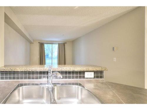 2113-16969 24 Street Sw, Calgary, AB - Indoor Photo Showing Kitchen With Double Sink