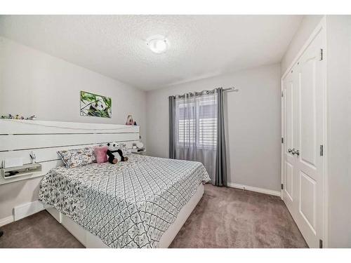 17 Red Embers Row Ne, Calgary, AB - Indoor Photo Showing Bedroom