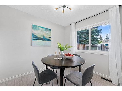 104-9803 24 Street Sw, Calgary, AB - Indoor Photo Showing Dining Room