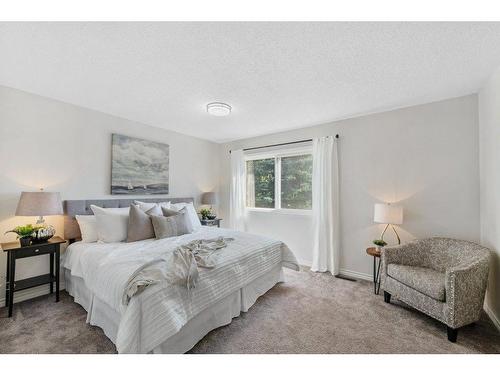 104-9803 24 Street Sw, Calgary, AB - Indoor Photo Showing Bedroom