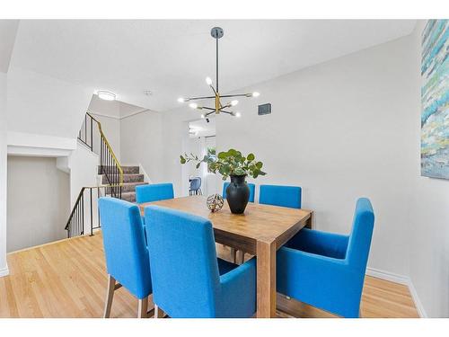 104-9803 24 Street Sw, Calgary, AB - Indoor Photo Showing Dining Room