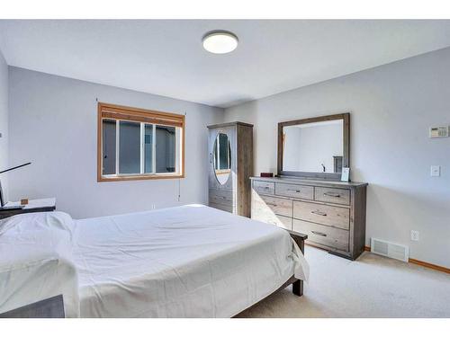 397 Panamount Drive Nw, Calgary, AB - Indoor Photo Showing Bedroom