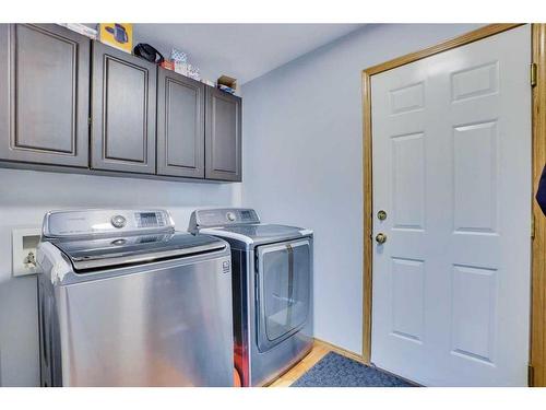 397 Panamount Drive Nw, Calgary, AB - Indoor Photo Showing Laundry Room