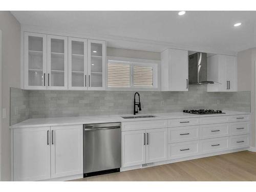 118 Springmere Drive, Chestermere, AB - Indoor Photo Showing Kitchen With Double Sink