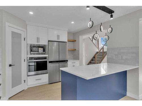 118 Springmere Drive, Chestermere, AB - Indoor Photo Showing Kitchen With Stainless Steel Kitchen