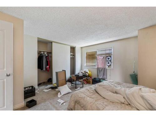 122-1555 Falconridge Drive Ne, Calgary, AB - Indoor Photo Showing Bedroom