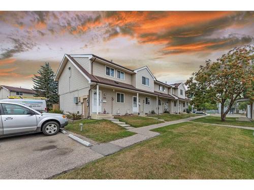 122-1555 Falconridge Drive Ne, Calgary, AB - Outdoor With Facade