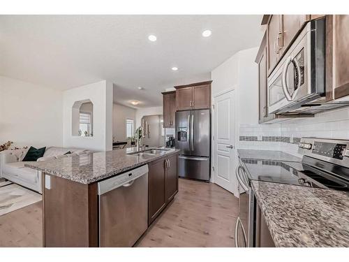 88 Nolancrest Green Nw, Calgary, AB - Indoor Photo Showing Kitchen With Stainless Steel Kitchen With Double Sink With Upgraded Kitchen