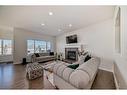 88 Nolancrest Green Nw, Calgary, AB  - Indoor Photo Showing Living Room With Fireplace 