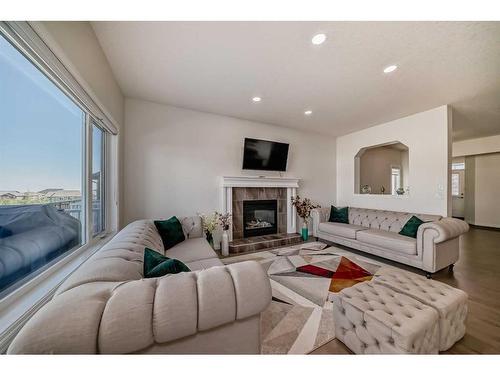 88 Nolancrest Green Nw, Calgary, AB - Indoor Photo Showing Living Room With Fireplace