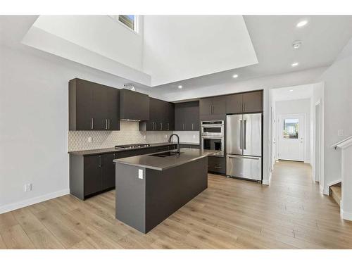 121 Marmot Walk Nw, Calgary, AB - Indoor Photo Showing Kitchen With Double Sink With Upgraded Kitchen