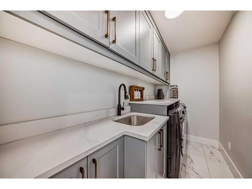 32 Saddlecrest Link Ne, Calgary, AB - Indoor Photo Showing Laundry Room