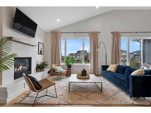 198 Bayview Circle, Airdrie, AB - Indoor Photo Showing Living Room With Fireplace