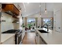 198 Bayview Circle, Airdrie, AB  - Indoor Photo Showing Kitchen With Double Sink With Upgraded Kitchen 