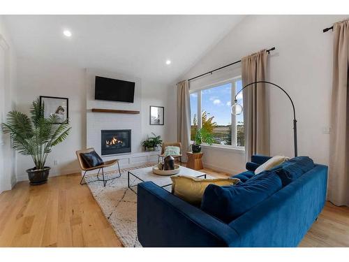 198 Bayview Circle, Airdrie, AB - Indoor Photo Showing Living Room With Fireplace