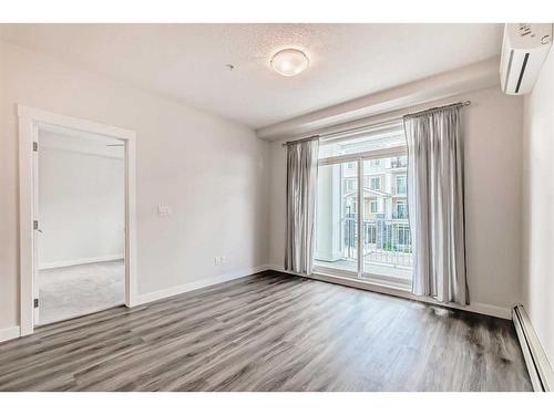 4207-522 Cranford Drive Se, Calgary, AB - Indoor Photo Showing Kitchen With Stainless Steel Kitchen With Upgraded Kitchen