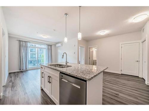 4207-522 Cranford Drive Se, Calgary, AB - Indoor Photo Showing Kitchen With Stainless Steel Kitchen With Upgraded Kitchen