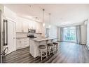 4207-522 Cranford Drive Se, Calgary, AB  - Indoor Photo Showing Kitchen With Stainless Steel Kitchen With Upgraded Kitchen 