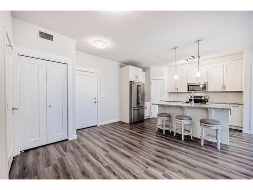 4207-522 Cranford Drive Se, Calgary, AB - Indoor Photo Showing Kitchen With Stainless Steel Kitchen With Double Sink With Upgraded Kitchen