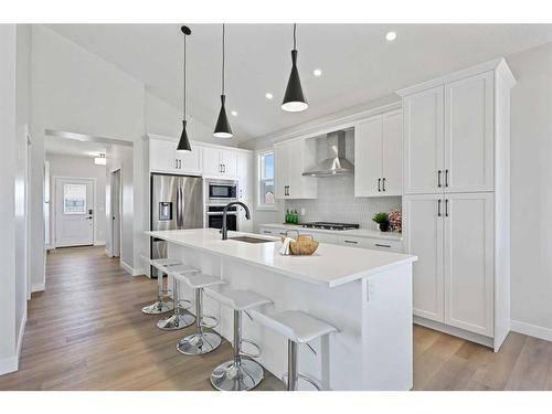 354 Baywater Common Sw, Airdrie, AB - Indoor Photo Showing Kitchen With Upgraded Kitchen