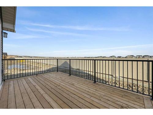 354 Baywater Common Sw, Airdrie, AB - Outdoor With Deck Patio Veranda