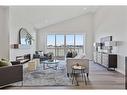 354 Baywater Common Sw, Airdrie, AB  - Indoor Photo Showing Living Room With Fireplace 