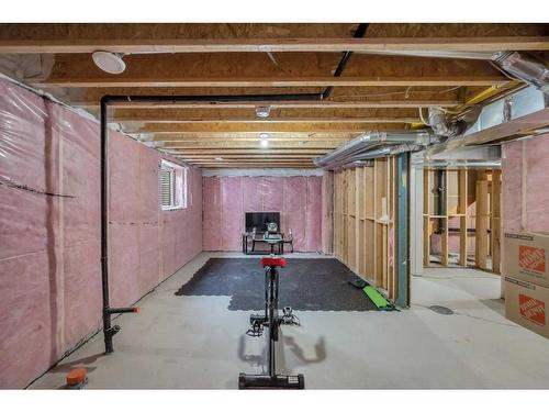 704 South Point Heath Sw, Airdrie, AB - Indoor Photo Showing Basement