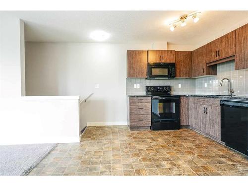 906-250 Sage Valley Road Nw, Calgary, AB - Indoor Photo Showing Kitchen