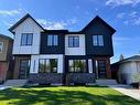 2827 Cocrane Road Nw, Calgary, AB  - Outdoor With Facade 