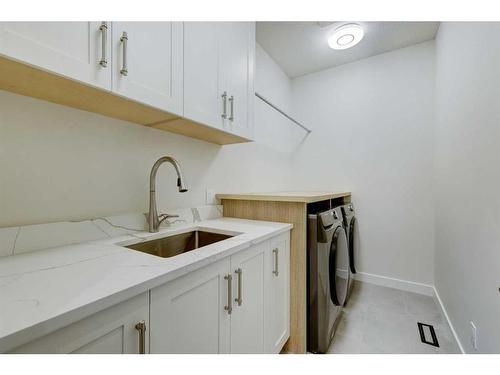 2827 Cocrane Road Nw, Calgary, AB - Indoor Photo Showing Laundry Room