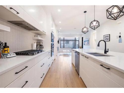 2433 30 Street Sw, Calgary, AB - Indoor Photo Showing Kitchen With Double Sink With Upgraded Kitchen