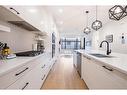 2433 30 Street Sw, Calgary, AB  - Indoor Photo Showing Kitchen With Double Sink With Upgraded Kitchen 