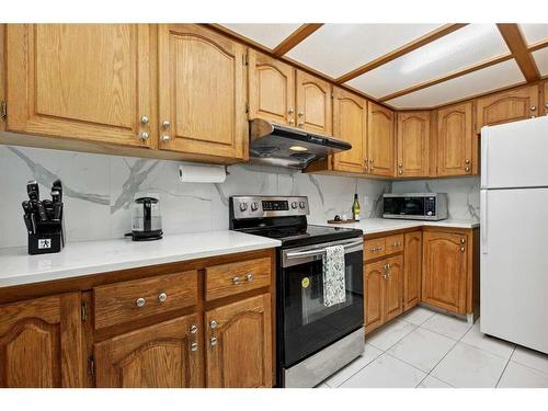 5994 Signal Ridge Heights Sw, Calgary, AB - Indoor Photo Showing Kitchen