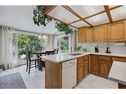 5994 Signal Ridge Heights Sw, Calgary, AB - Indoor Photo Showing Living Room With Fireplace