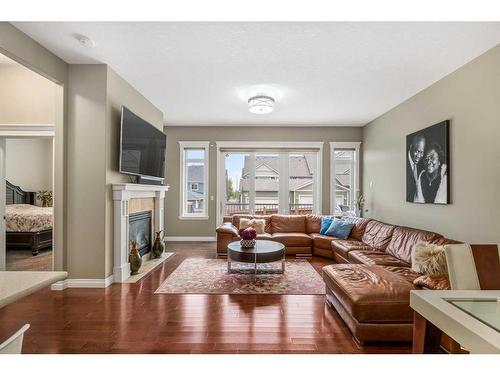 318 Mahogany Manor Se, Calgary, AB - Indoor Photo Showing Living Room With Fireplace