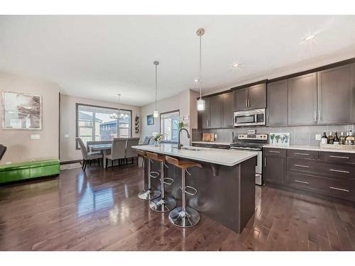 118 Bayview Street Sw, Airdrie, AB - Indoor Photo Showing Kitchen With Upgraded Kitchen