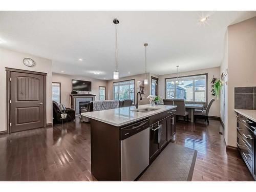 118 Bayview Street Sw, Airdrie, AB - Indoor Photo Showing Kitchen With Double Sink With Upgraded Kitchen