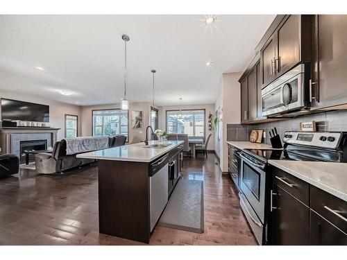 118 Bayview Street Sw, Airdrie, AB - Indoor Photo Showing Kitchen With Upgraded Kitchen