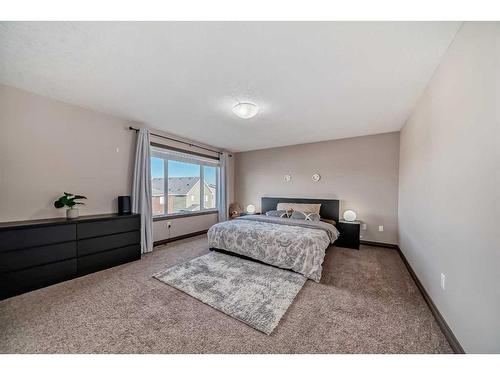 118 Bayview Street Sw, Airdrie, AB - Indoor Photo Showing Bedroom