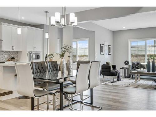 1378 Bayview Crescent Sw, Airdrie, AB - Indoor Photo Showing Dining Room