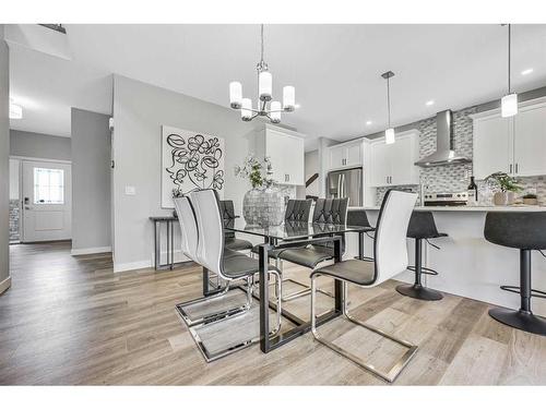 1378 Bayview Crescent Sw, Airdrie, AB - Indoor Photo Showing Dining Room