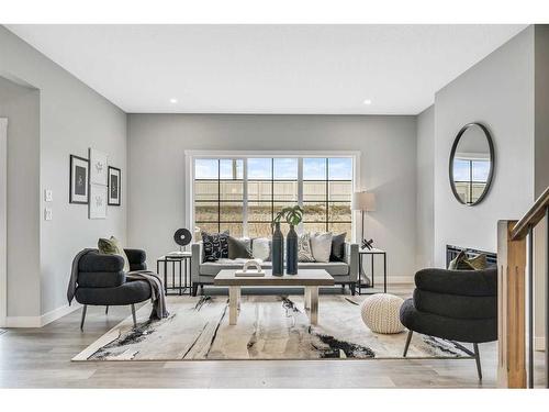 1378 Bayview Crescent Sw, Airdrie, AB - Indoor Photo Showing Living Room