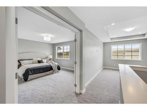 1378 Bayview Crescent Sw, Airdrie, AB - Indoor Photo Showing Bedroom